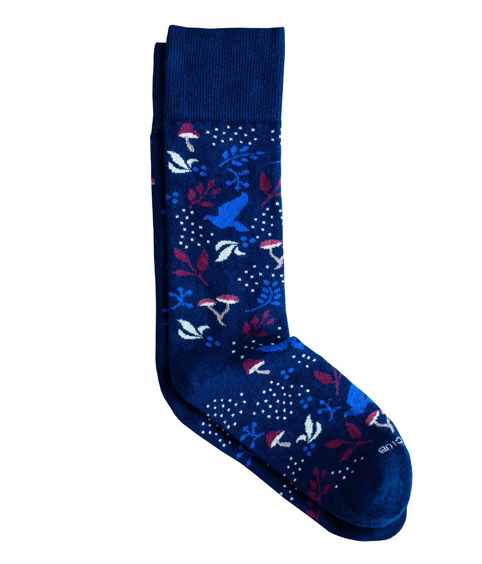 The Woodland sock in the Navy color variation that features mushrooms and leaves.